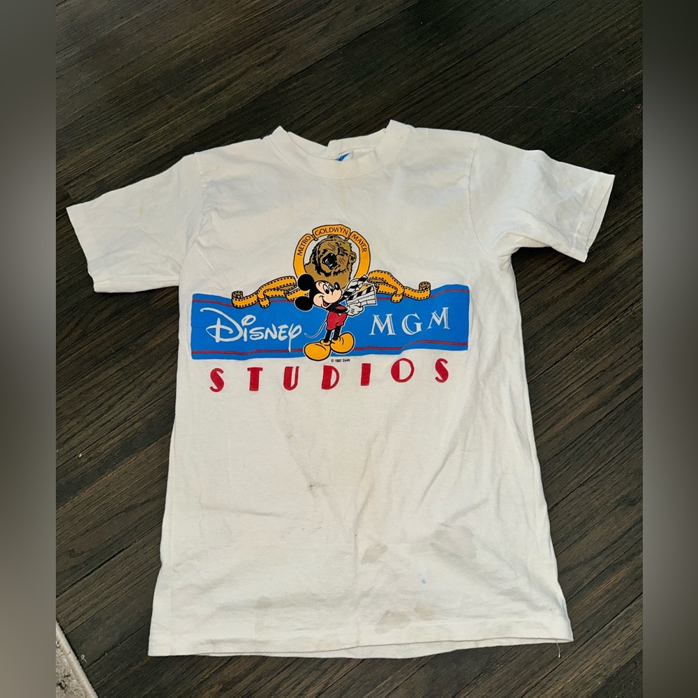 VTG 1987 Disney White Tee with Blue, Red and Yellow MGM Mickey Graphic small